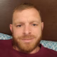 Travis B.